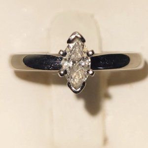 .25 CARAT SOLITAIRE MARQUISE DIAMOND RING, SIZE 5